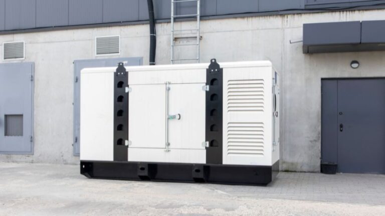 Heavy-duty industrial generator outdoor installation with noise-reducing enclosures for commercial power backup solutions.