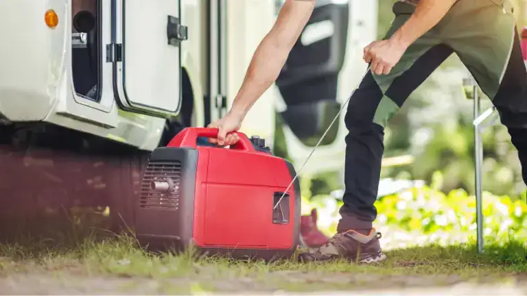 Portable red generator being handled outdoors, ideal for camping, outdoor activities, and emergency power backup.